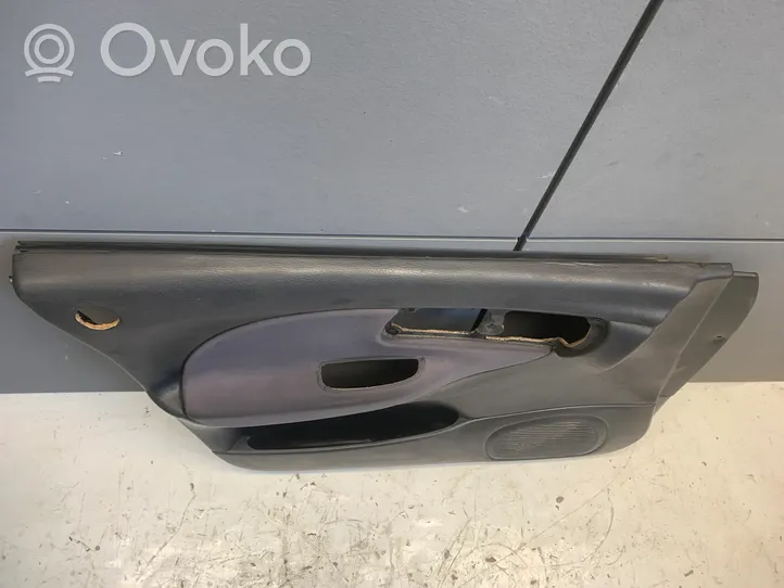 Subaru Impreza I Front door card panel trim 