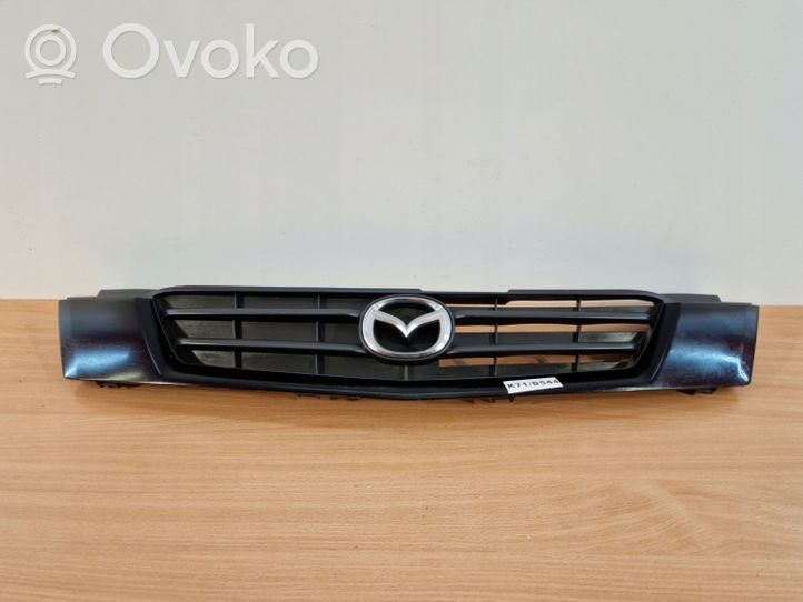 Mazda Demio Grille calandre supérieure de pare-chocs avant DC3550712