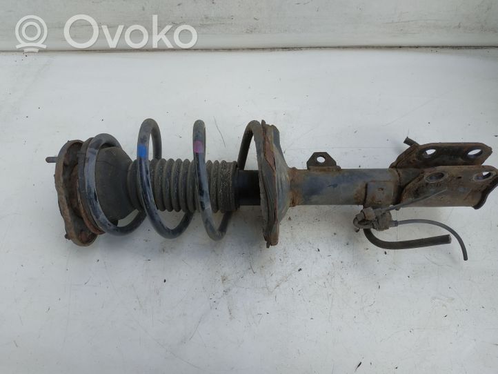 Toyota Avensis T250 Front shock absorber with coil spring 