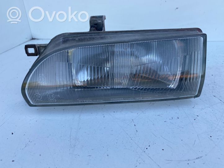 Toyota Corolla E90 Faro/fanale 12307