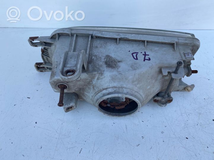 Toyota Corolla E90 Lampa przednia 2121140