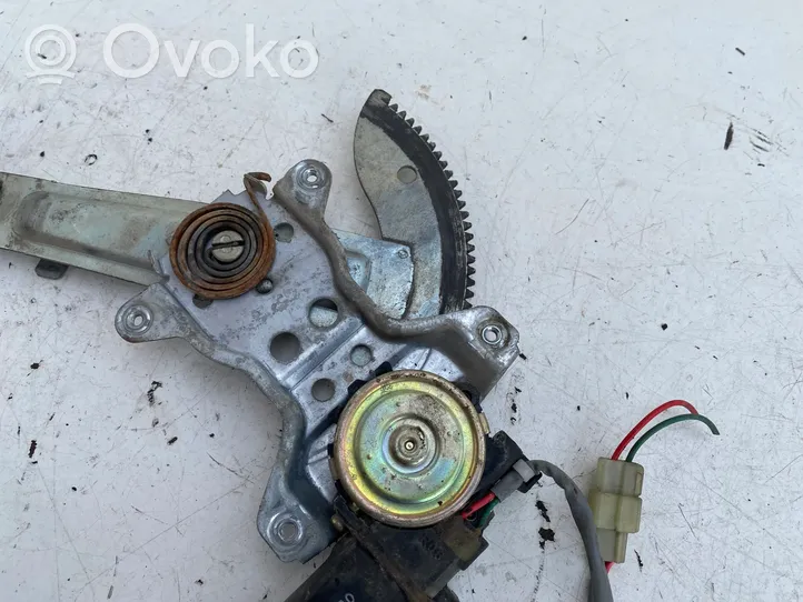 Toyota Carina T170 Elektryczny podnośnik szyby drzwi przednich 8571020080