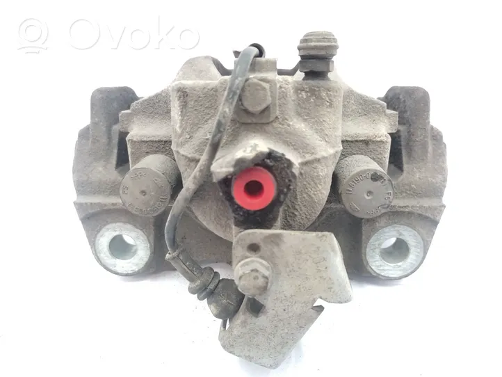 Volkswagen Touareg I Brake caliper pad carrier rear 7L6615424