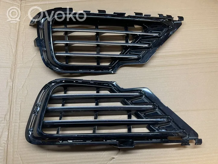 Volkswagen Touareg II Mascherina/griglia fendinebbia anteriore 7P6853666G