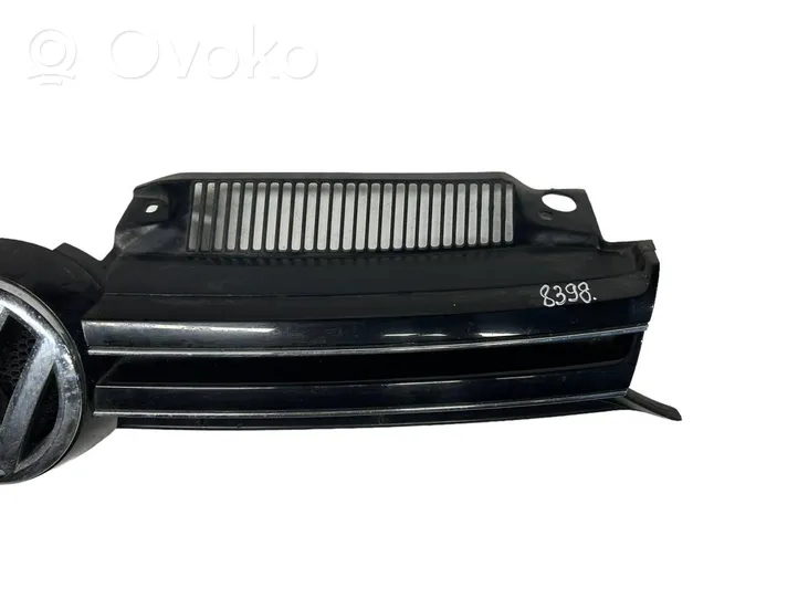 Volkswagen Golf VI Griglia superiore del radiatore paraurti anteriore 1K9853653A