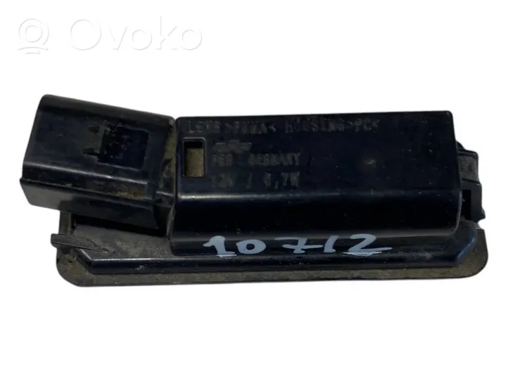 Volkswagen PASSAT B8 Lampa oświetlenia tylnej tablicy rejestracyjnej 1K8943021D