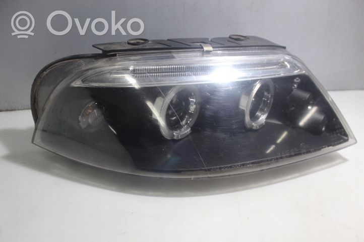 Volkswagen PASSAT B5.5 Lampa przednia HU210-HBAS