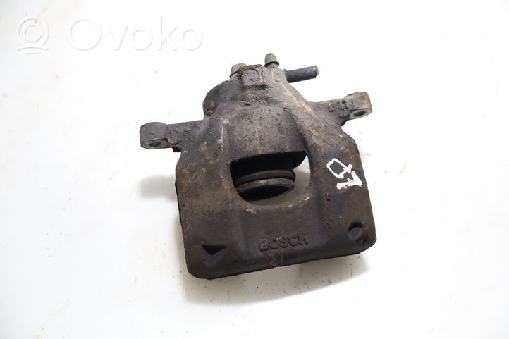 Toyota Aygo AB40 Caliper de freno delantero 