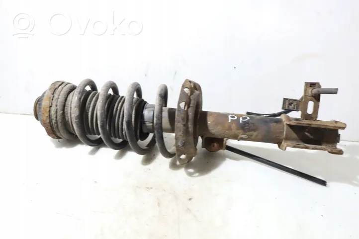 Opel Zafira B Front shock absorber with coil spring 