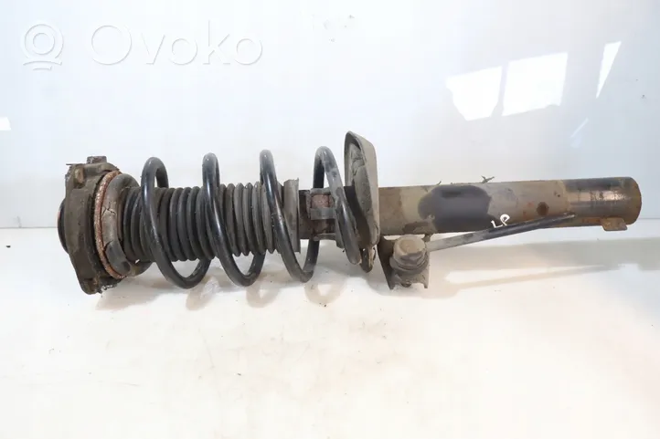 Seat Leon (1P) Front shock absorber with coil spring 