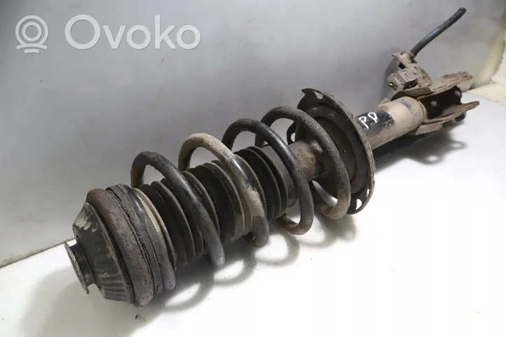 Opel Zafira B Front shock absorber with coil spring 