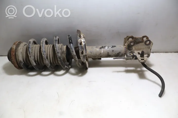 Opel Astra H Front shock absorber with coil spring 