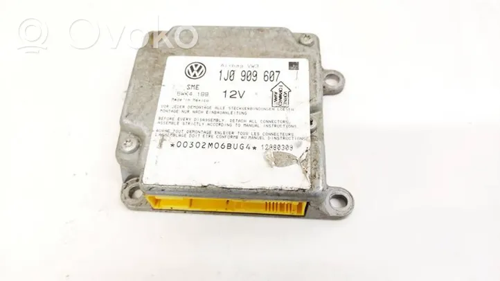 Volkswagen PASSAT B5 Airbag control unit/module 1J0909607