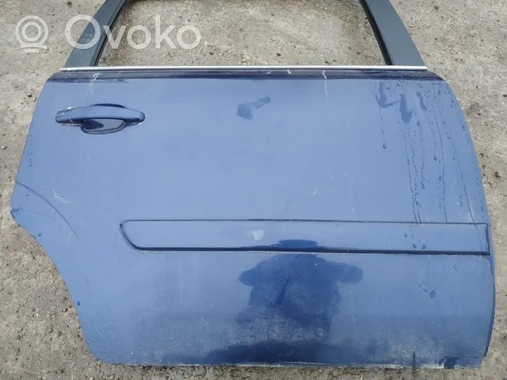 Opel Zafira B Rear door melynos