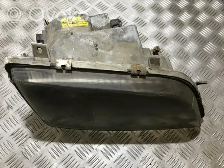 Opel Omega A Lampa przednia 90377058