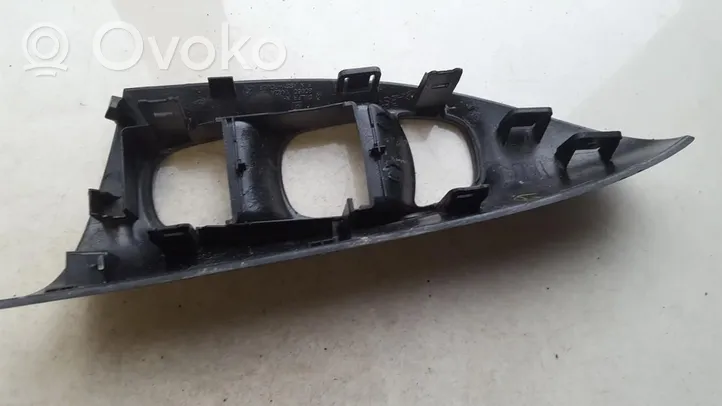 Nissan Juke I F15 Rivestimento pulsantiera finestrino della portiera anteriore 809601KA2A