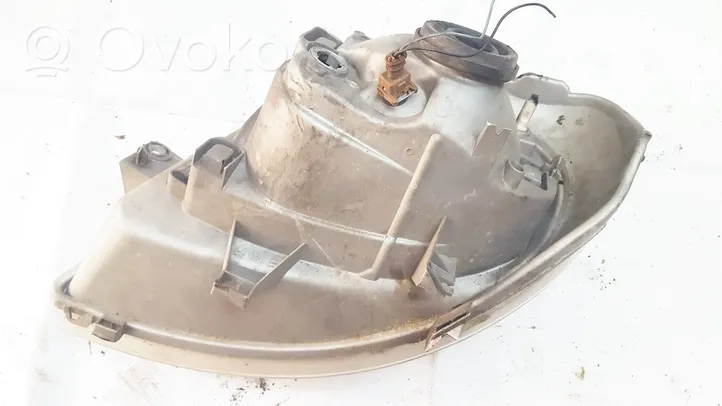 Renault Trafic II (X83) Lampa przednia 7700311374