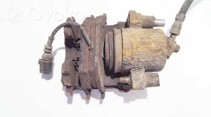 Volkswagen Golf VI Front brake caliper 