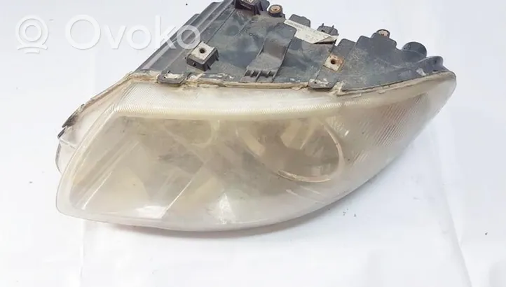 Chrysler Voyager Lampa przednia 04857833aci