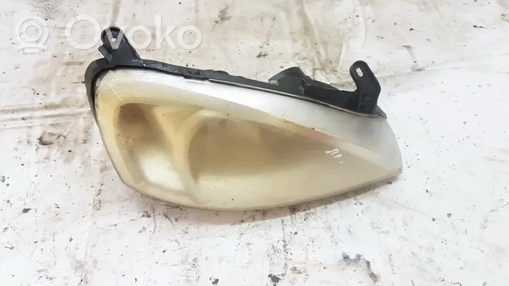 Opel Corsa C Lampa przednia 13115007