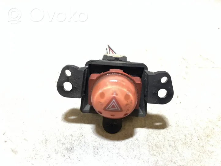 Nissan Almera Tino Botón interruptor de luz de peligro 06016