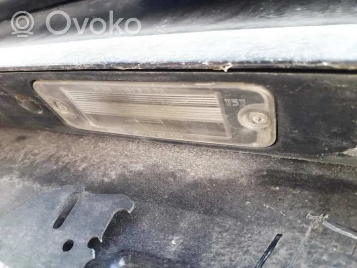 Saab 9-3 Ver1 Lampa oświetlenia tylnej tablicy rejestracyjnej 