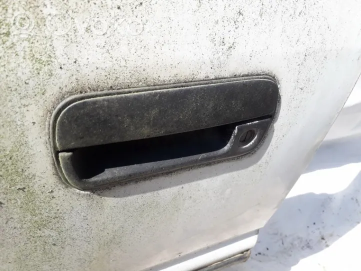 Hyundai Pony Front door exterior handle 