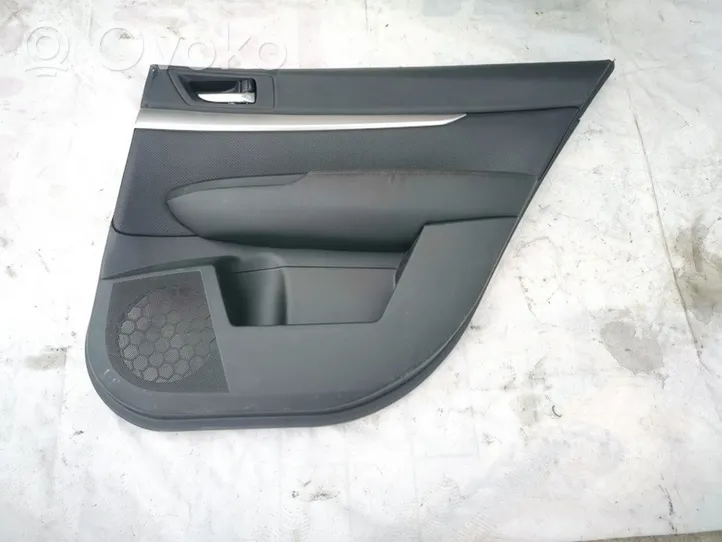 Subaru Legacy Garniture panneau de porte arrière s73508400