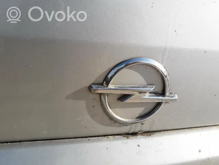 Opel Astra G Mostrina con logo/emblema della casa automobilistica 