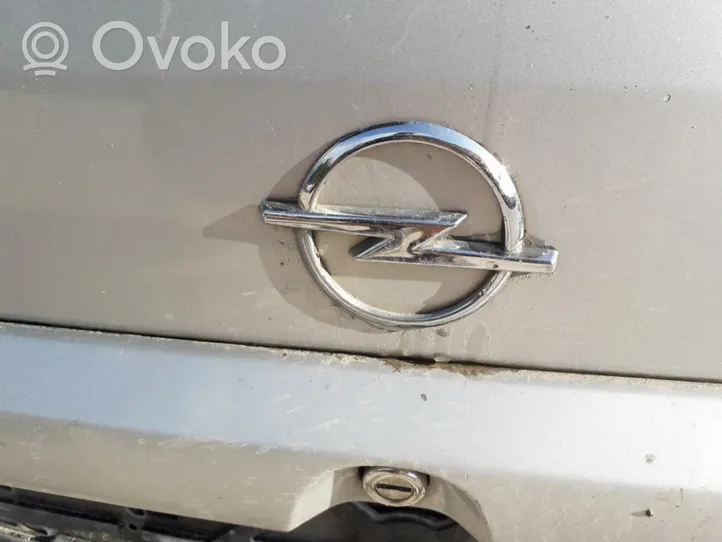 Opel Astra G Mostrina con logo/emblema della casa automobilistica 