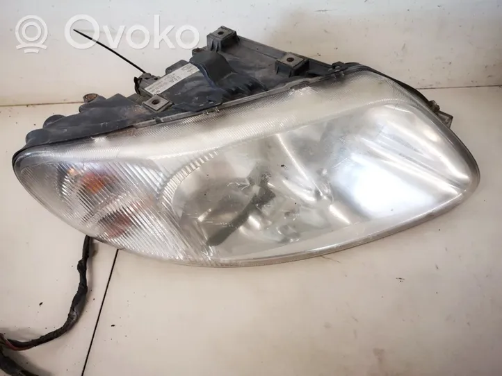 Dodge Caravan Lampa przednia 04857702ab