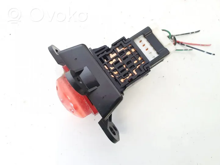 Nissan Almera Tino Botón interruptor de luz de peligro 06016