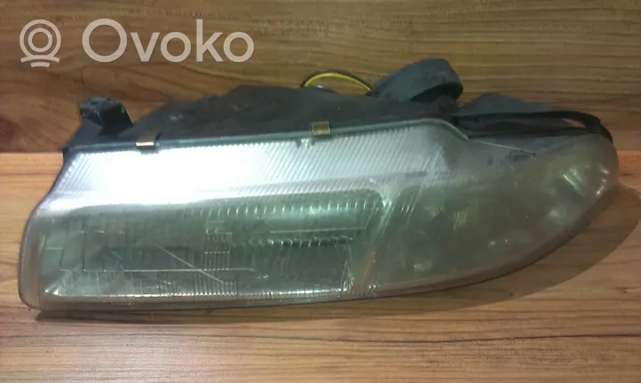 Chrysler Stratus Lampa przednia 93820001