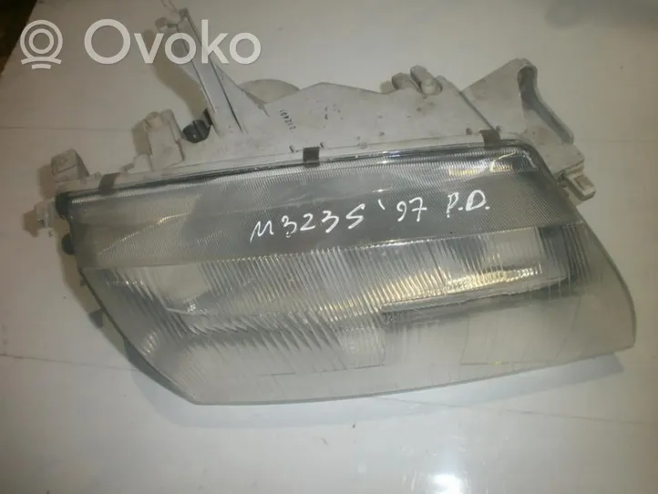 Mazda 323 Lampa przednia 1305235337