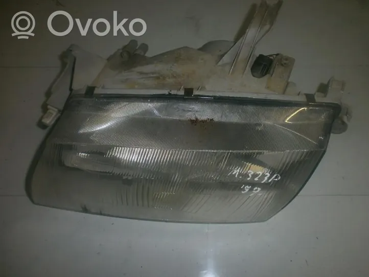 Mazda 323 Lampa przednia 1305235336