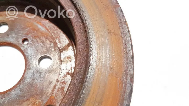 Toyota Corolla E120 E130 Tarcza hamulca tylnego neventiliuojamas