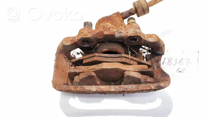 Volkswagen PASSAT B2 Front brake caliper 