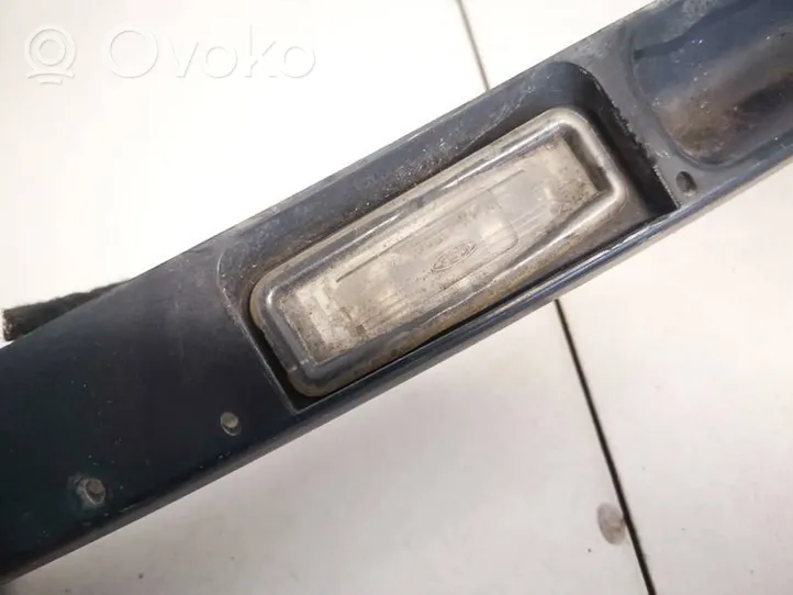 Ford Focus Lampa oświetlenia tylnej tablicy rejestracyjnej xs4x13550a