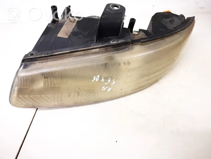 Chrysler Voyager Lampa przednia 04576313ad