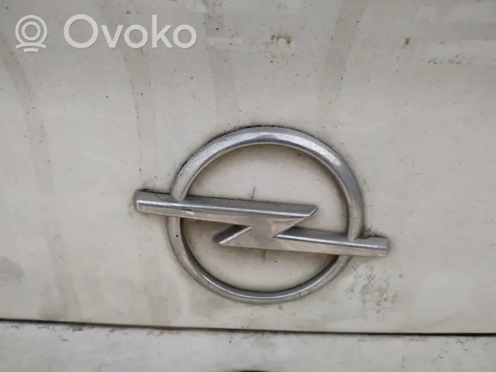 Opel Astra G Mostrina con logo/emblema della casa automobilistica 