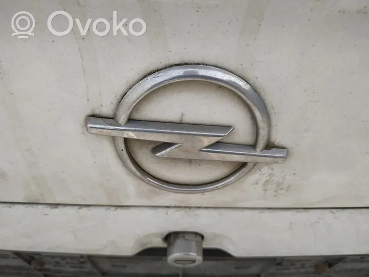 Opel Astra G Mostrina con logo/emblema della casa automobilistica 