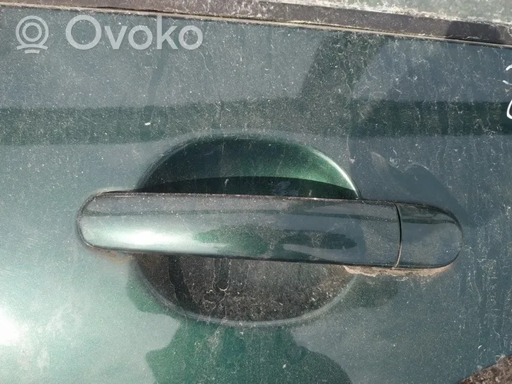 Opel Zafira B Front door exterior handle 
