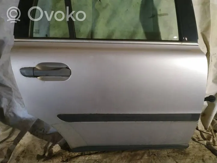 Volvo XC90 Takaovi sidabrines