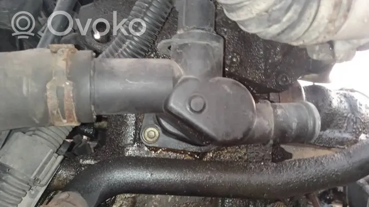 Volkswagen Jetta V Tuyau de liquide de refroidissement moteur 06A121133AL