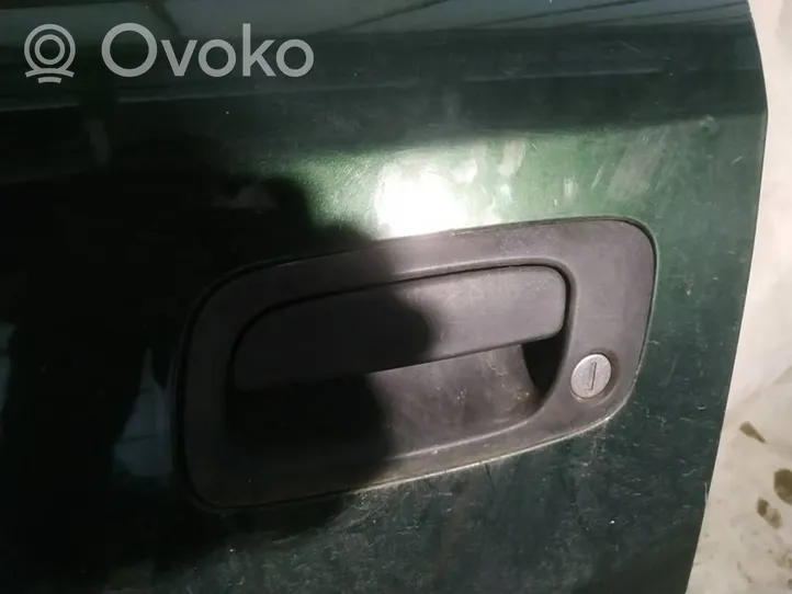 Opel Astra G Front door exterior handle 