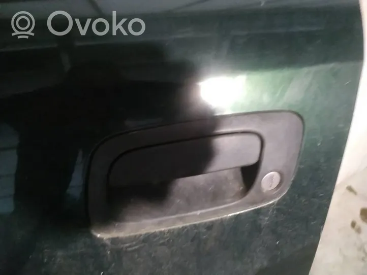 Opel Astra G Front door exterior handle 