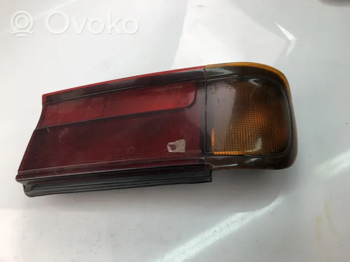 Mitsubishi Colt Lampy tylnej klapy bagażnika 0438557L