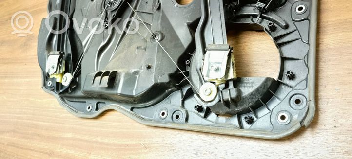 Volkswagen Touareg II Front door window regulator with motor 8K0959802B