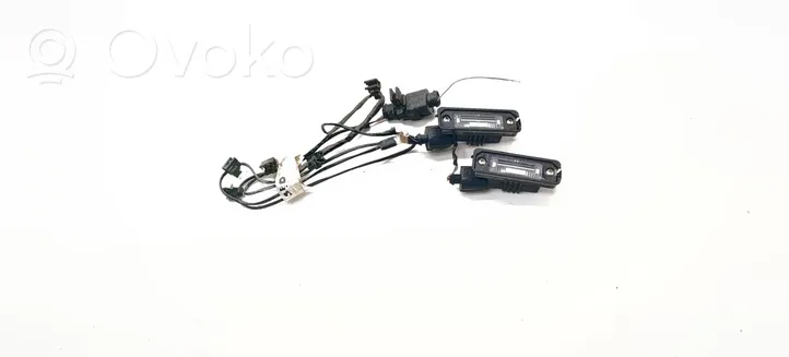 Volkswagen PASSAT B6 Lampa oświetlenia tylnej tablicy rejestracyjnej 1J6943021B