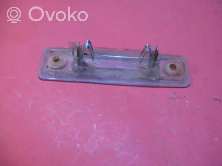 Opel Omega B1 Lampa oświetlenia tylnej tablicy rejestracyjnej 22877R4